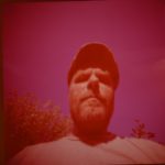 selfportrait shot with pinhole camera on colour film